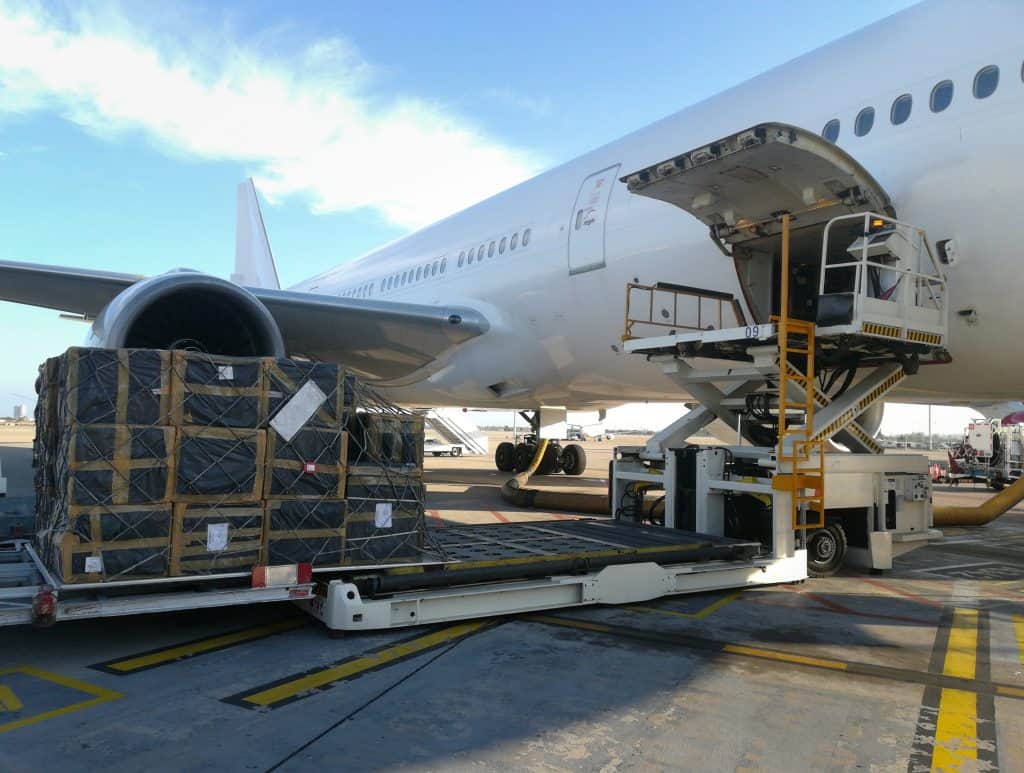 Aero freight plane being loaded - Air freight services