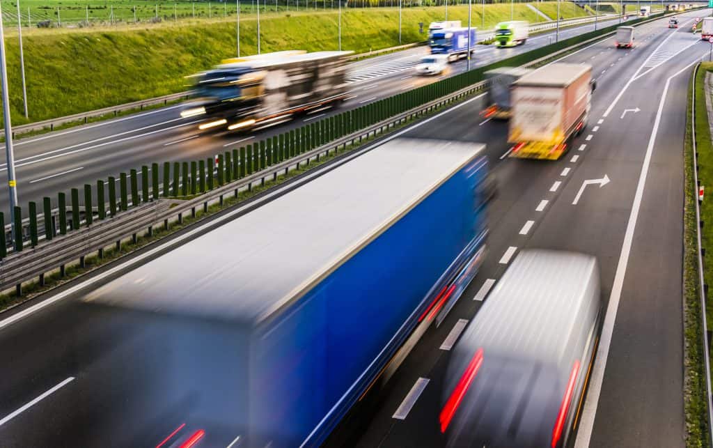 Lorry moving fast on road - customs clearance services
